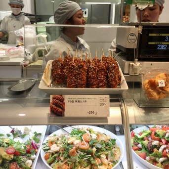 Matsuzakaya Department Store depachika or food hall. Prepared food is marked down 60% at 6pm and customers go wild!